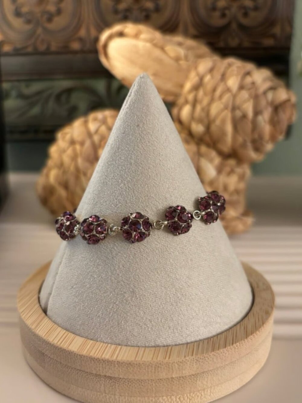 Purple colored stones and CZ on chocolate gold bracelet